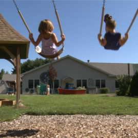 Children on Swing Set
